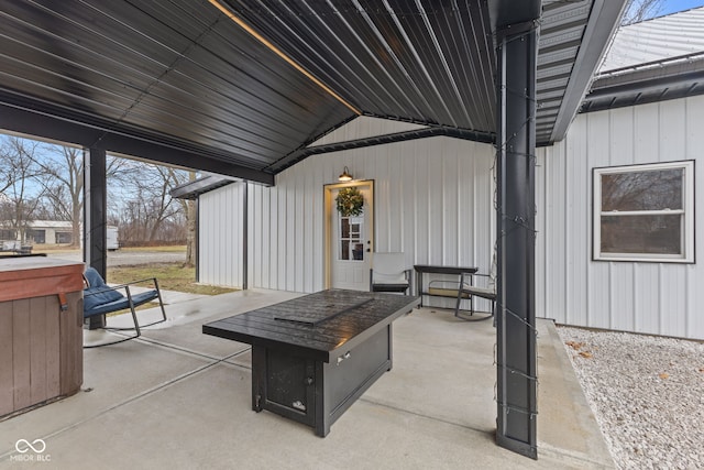 view of patio with a fire pit