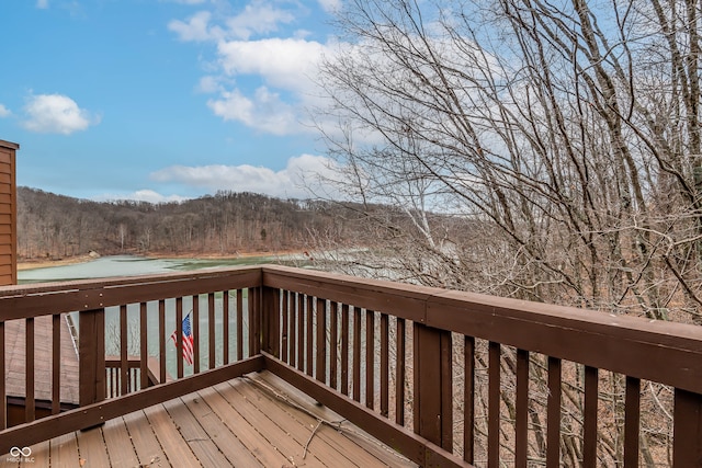 wooden deck with a water view