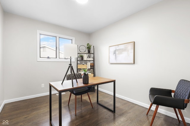 office area featuring dark wood-type flooring