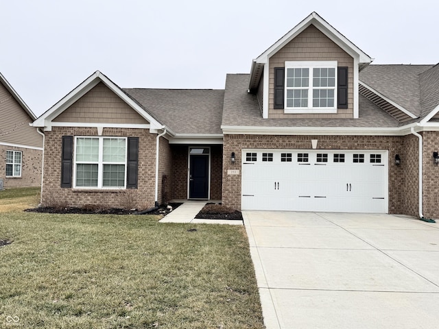 craftsman house with a garage and a front yard