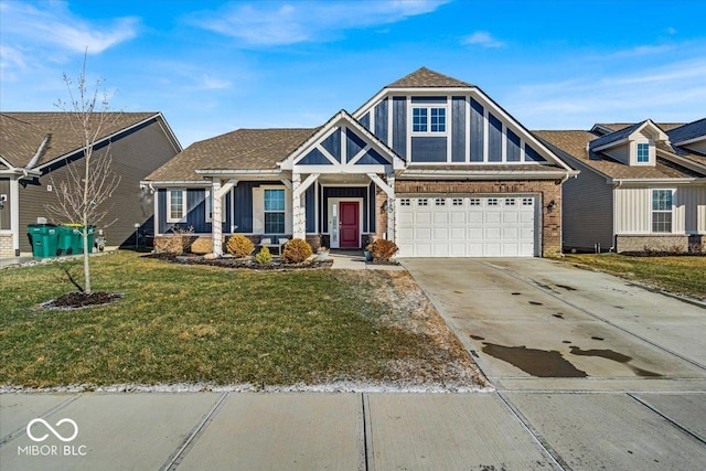 view of front of home with an attached garage, brick siding, driveway, roof with shingles, and a front yard