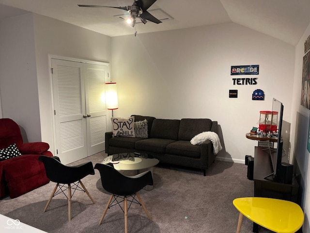 carpeted living room with lofted ceiling, ceiling fan, and baseboards