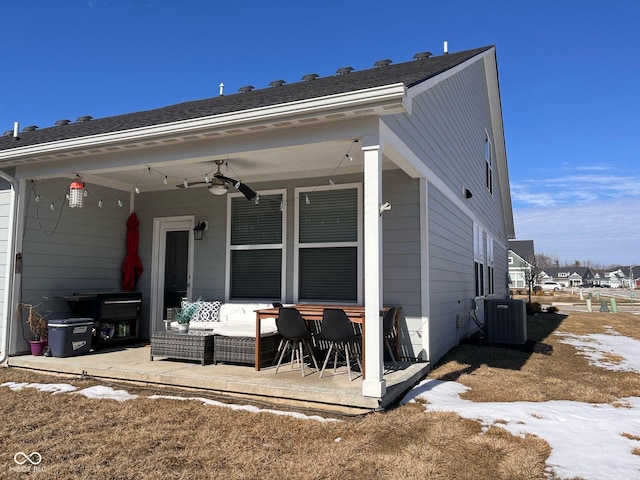 rear view of house featuring an outdoor hangout area, a patio area, cooling unit, and a ceiling fan