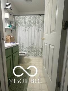 bathroom featuring walk in shower, vanity, and toilet