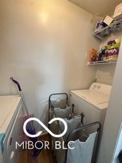 laundry room with separate washer and dryer