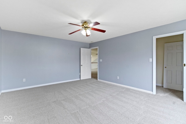 unfurnished bedroom with light colored carpet and ceiling fan