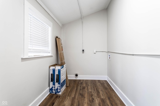 clothes washing area featuring dark hardwood / wood-style flooring, hookup for a washing machine, and hookup for an electric dryer