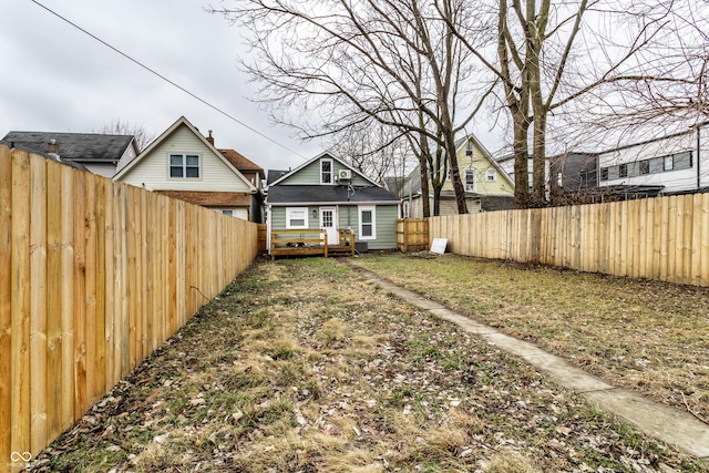 view of yard featuring a wooden deck