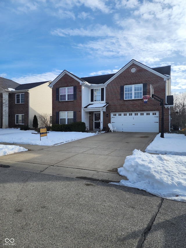 view of front of property with a garage