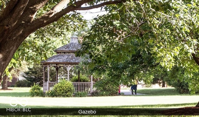 view of property's community featuring a gazebo and a yard