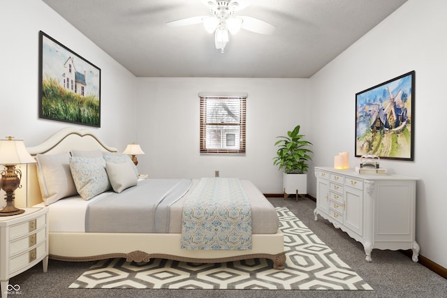 bedroom featuring baseboards, dark carpet, and a ceiling fan