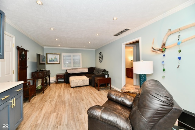 11710 E 75th St, Indianapolis, IN 46236 - living room featuring ornamental molding, light hardwood / wood-style floors, and a textured ceiling