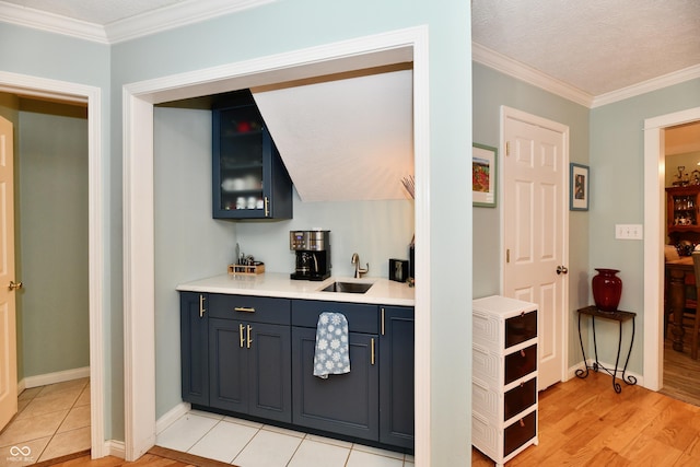 11710 E 75th St, Indianapolis, IN 46236 - bar with crown molding, sink, and light hardwood / wood-style flooring