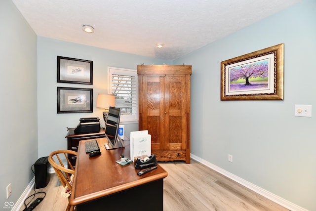 11710 E 75th St, Indianapolis, IN 46236 - office space featuring a textured ceiling and light wood-type flooring