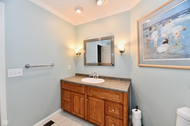 11710 E 75th St, Indianapolis, IN 46236 - bathroom with vanity, crown molding, tile patterned floors, and toilet