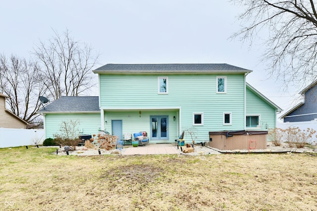 11710 E 75th St, Indianapolis, IN 46236 - rear view of house with a hot tub, a patio area, and a lawn