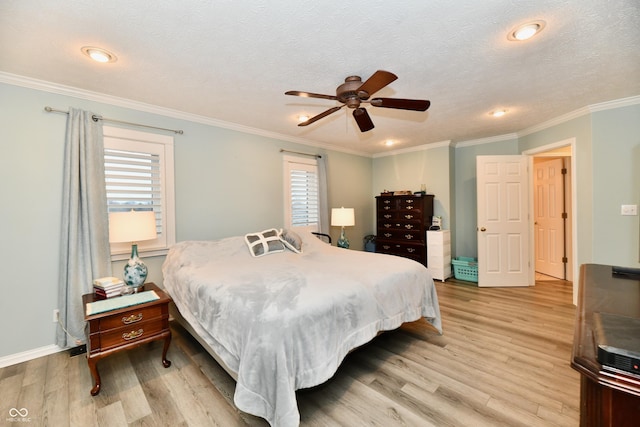 11710 E 75th St, Indianapolis, IN 46236 - bedroom with multiple windows, ornamental molding, a textured ceiling, and light wood-type flooring