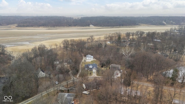 birds eye view of property with a rural view