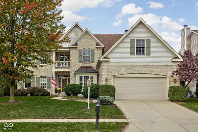 view of front facade featuring a garage and a front lawn