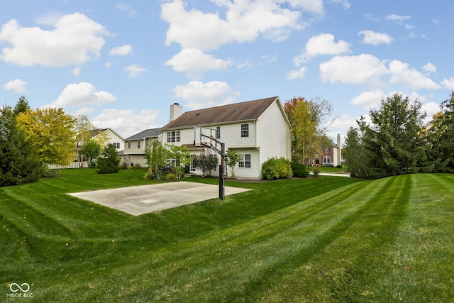 exterior space with a lawn and a patio area