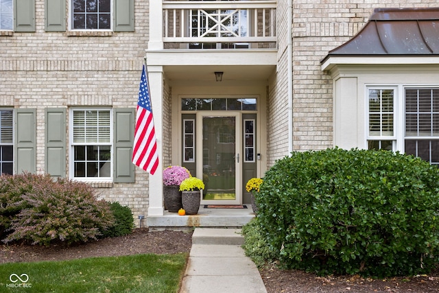 doorway to property with a balcony