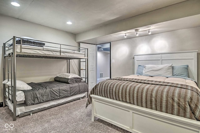 bedroom featuring carpet floors, visible vents, and recessed lighting