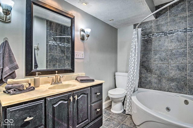 bathroom with baseboards, toilet, a combined bath / shower with jetted tub, a textured ceiling, and vanity