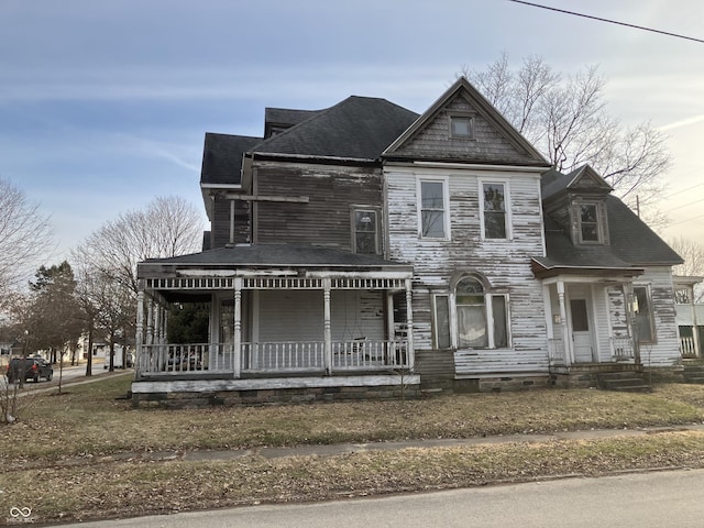 victorian home featuring covered porch