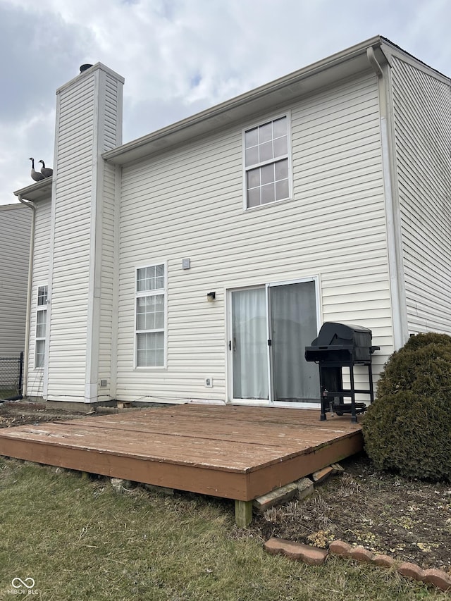 rear view of house with a deck