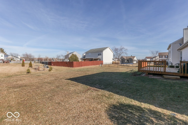 view of yard featuring a wooden deck