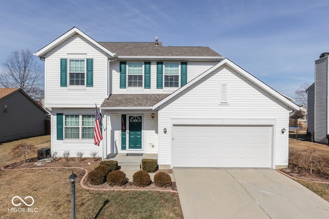 view of front of home with a garage