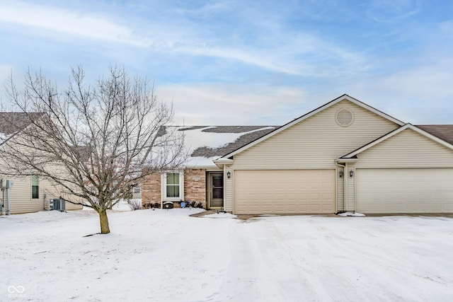 ranch-style home featuring central AC unit