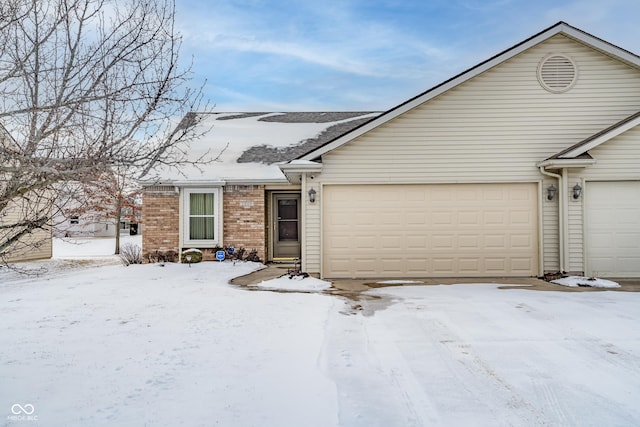 single story home with a garage