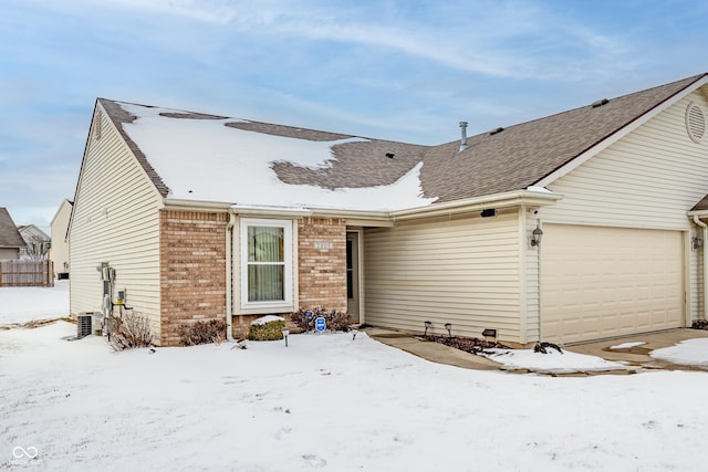 ranch-style house featuring a garage