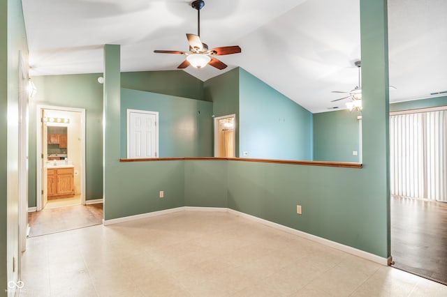 unfurnished room with lofted ceiling and ceiling fan