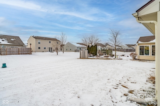 view of yard covered in snow