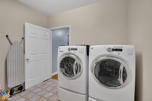 laundry area with independent washer and dryer