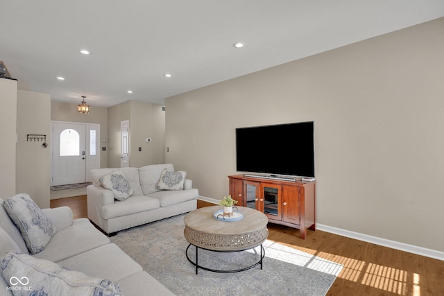 living room with light hardwood / wood-style flooring