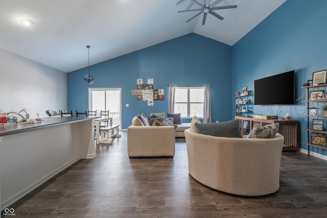 living room with dark wood-type flooring, high vaulted ceiling, and ceiling fan