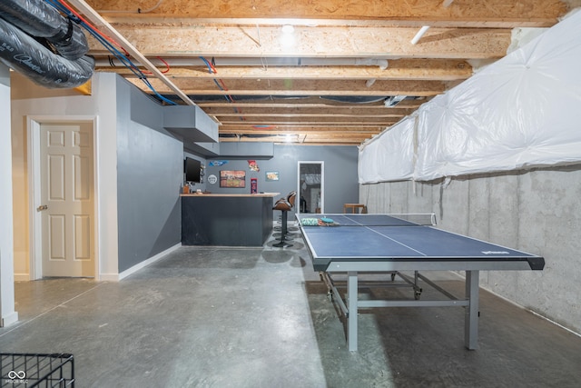 recreation room featuring indoor bar