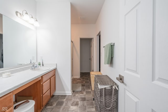 bathroom with vanity and walk in shower