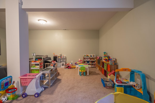 recreation room featuring carpet flooring