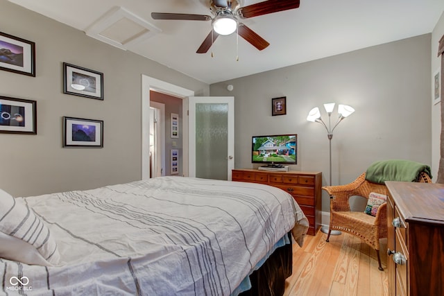 bedroom featuring ceiling fan and light wood-type flooring