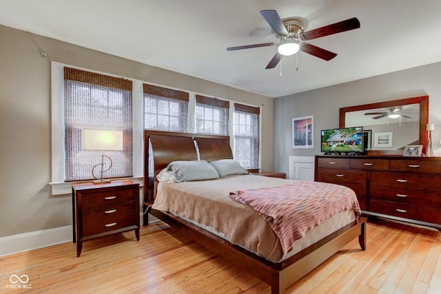 bedroom featuring ceiling fan and light wood-type flooring