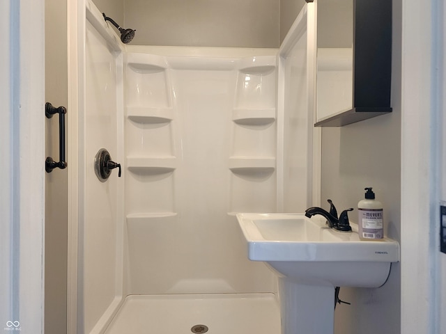 bathroom featuring a stall shower