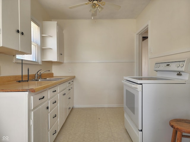 kitchen with baseboards, white range with electric cooktop, open shelves, a sink, and white cabinetry