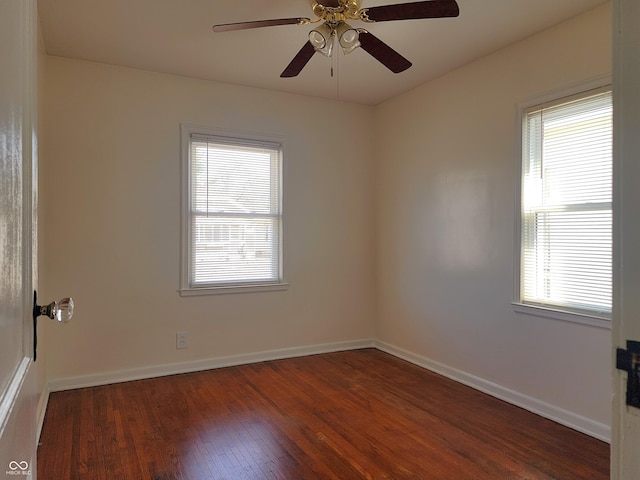 unfurnished room featuring ceiling fan, baseboards, and hardwood / wood-style flooring