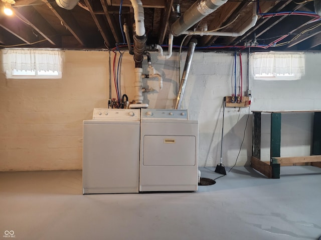 below grade area featuring washer and dryer