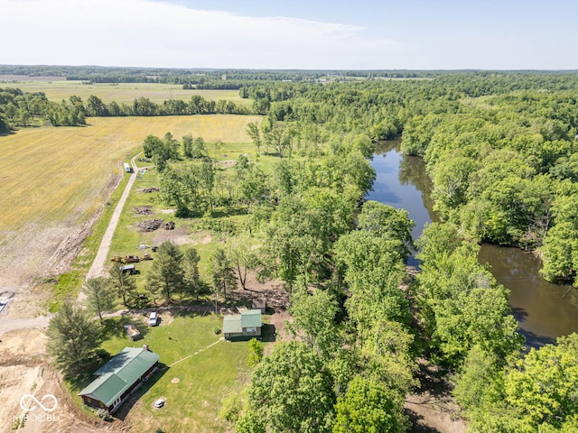 drone / aerial view featuring a rural view and a water view