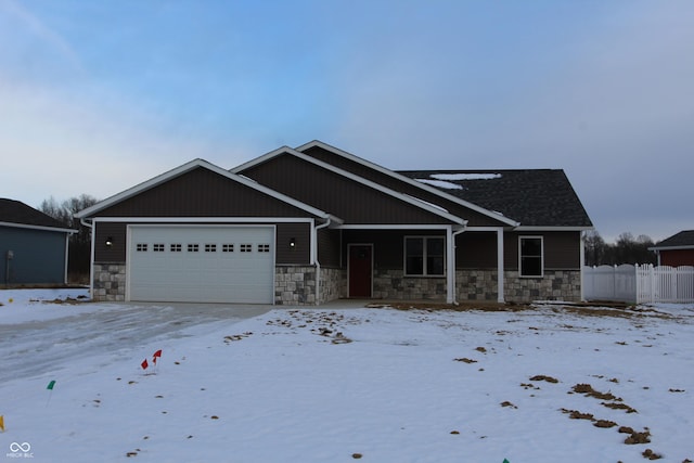 craftsman house with a garage